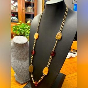 Avon - long (@ 36”) necklace - gold toned - 7 accent pieces